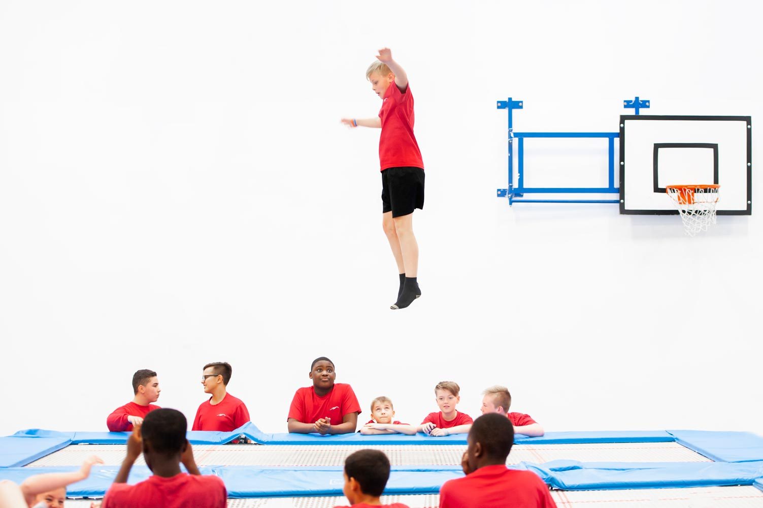 Award winning school website photography of school children trampoling