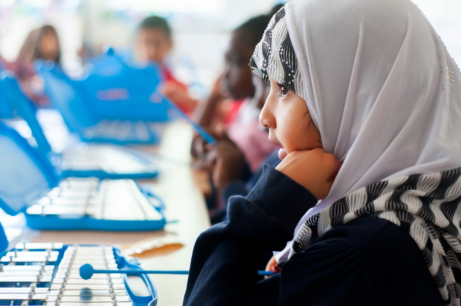 School pupil playing glockenspiel 