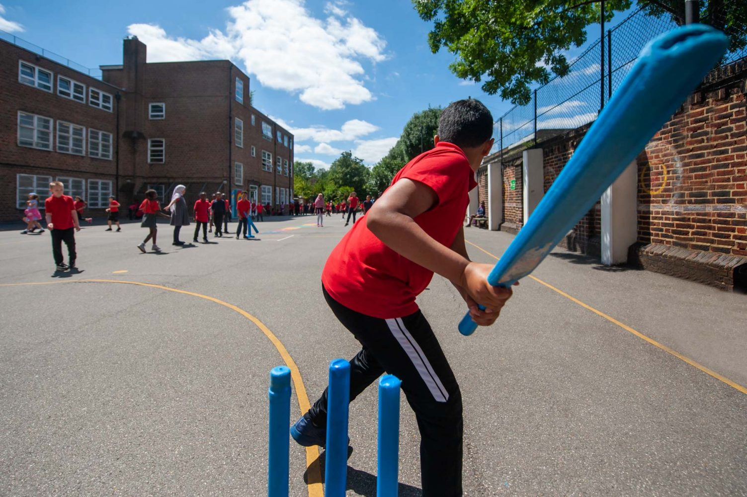 Islington school website photogrpahy of cricket in the playground