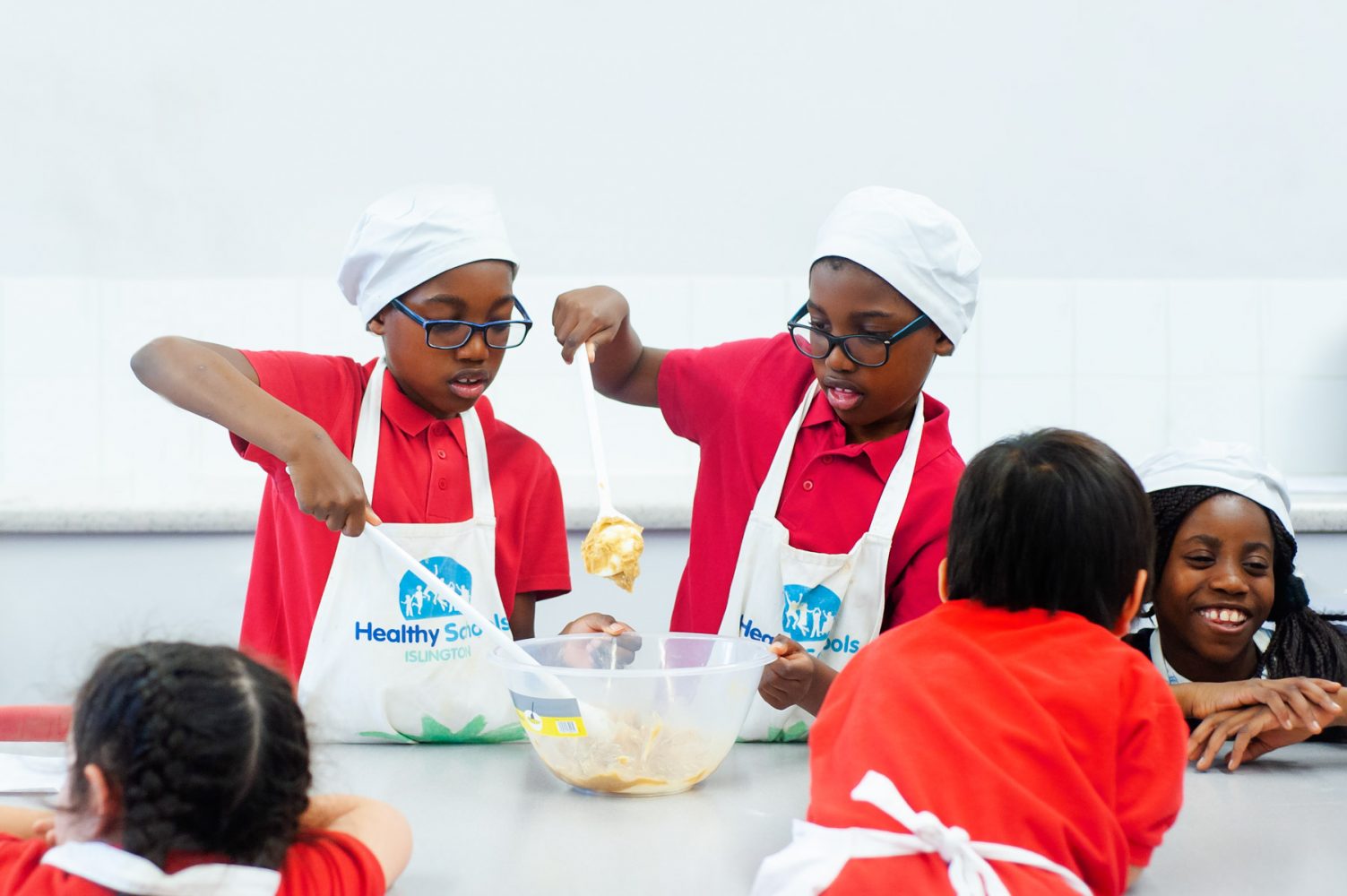 Primary school website photography of pupils in food tech class